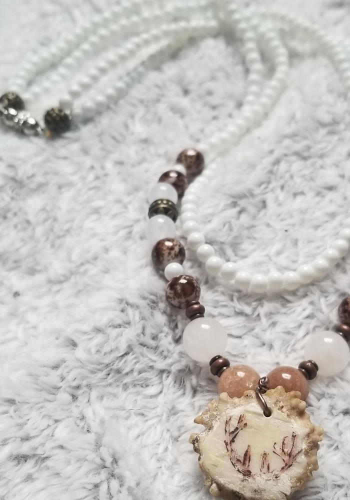 Two string necklace with antler embellishment